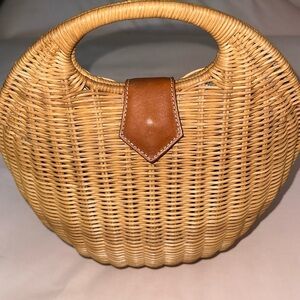 Brand new J.McLaughlin Victoria woven Circular purse.
